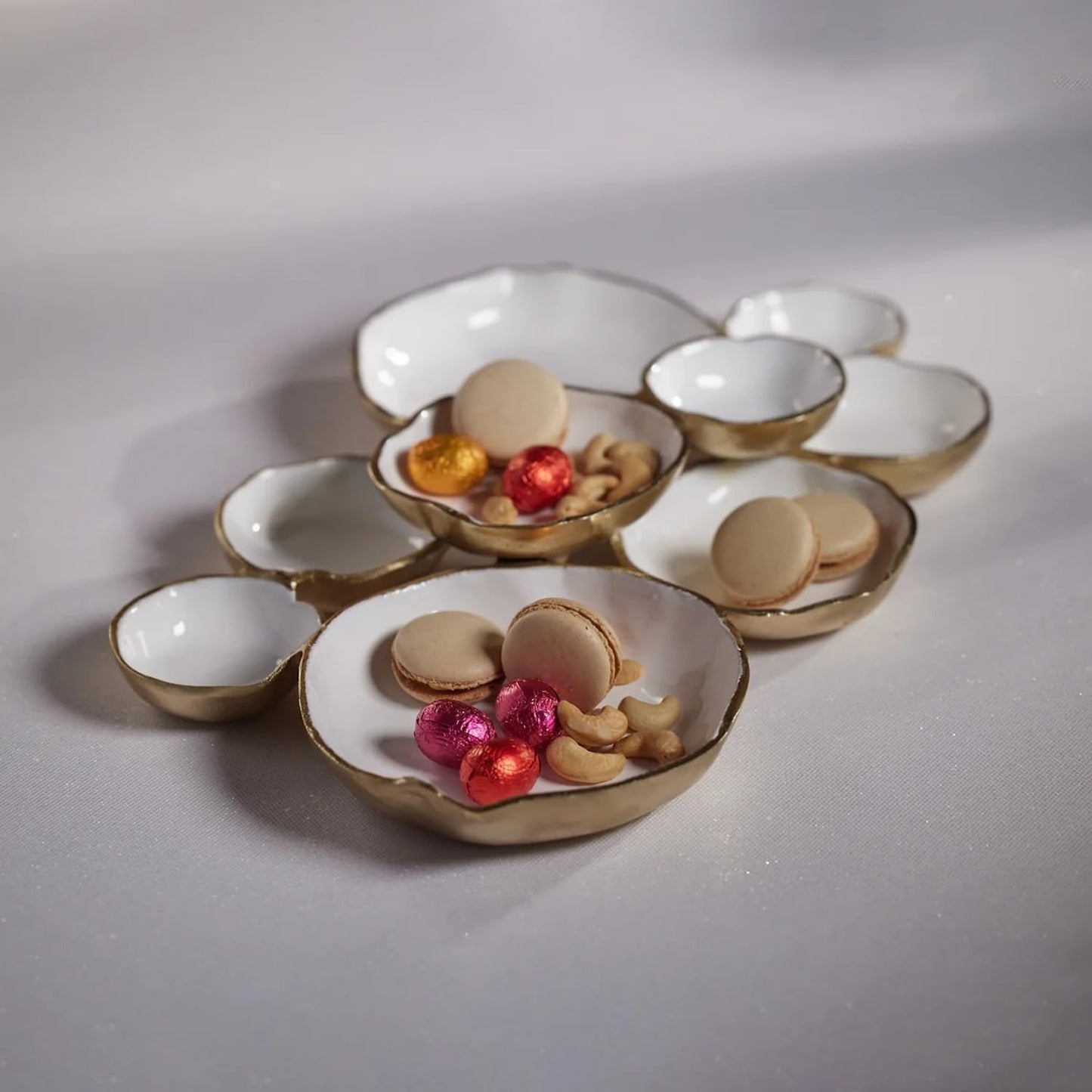 Zodax Cluster of Nine Round Serving Bowls | Gold and White Enamel | 19 in x 12 in x 2.5 in