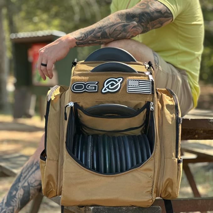 Discology Disc Golf OG V3 Disc Golf Bag | 26+ Disc Capacity | Premium Disc Golf Backpack Bag | Tough, Durable Design | 2 Large Top and Side Compartments | Top Patch Panel with Three Patchs Included