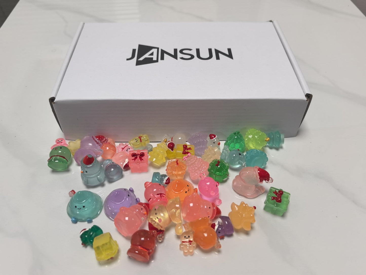 Jansun Mini Christmas Luminous Figurines, 45pcs Christmas Resin Snowman Christmas Tree Gift Box Gingerbread Man Glow in The Dark Decorations for DIY Crafts Xmas Party Gifts Garden Dollhouse Decor