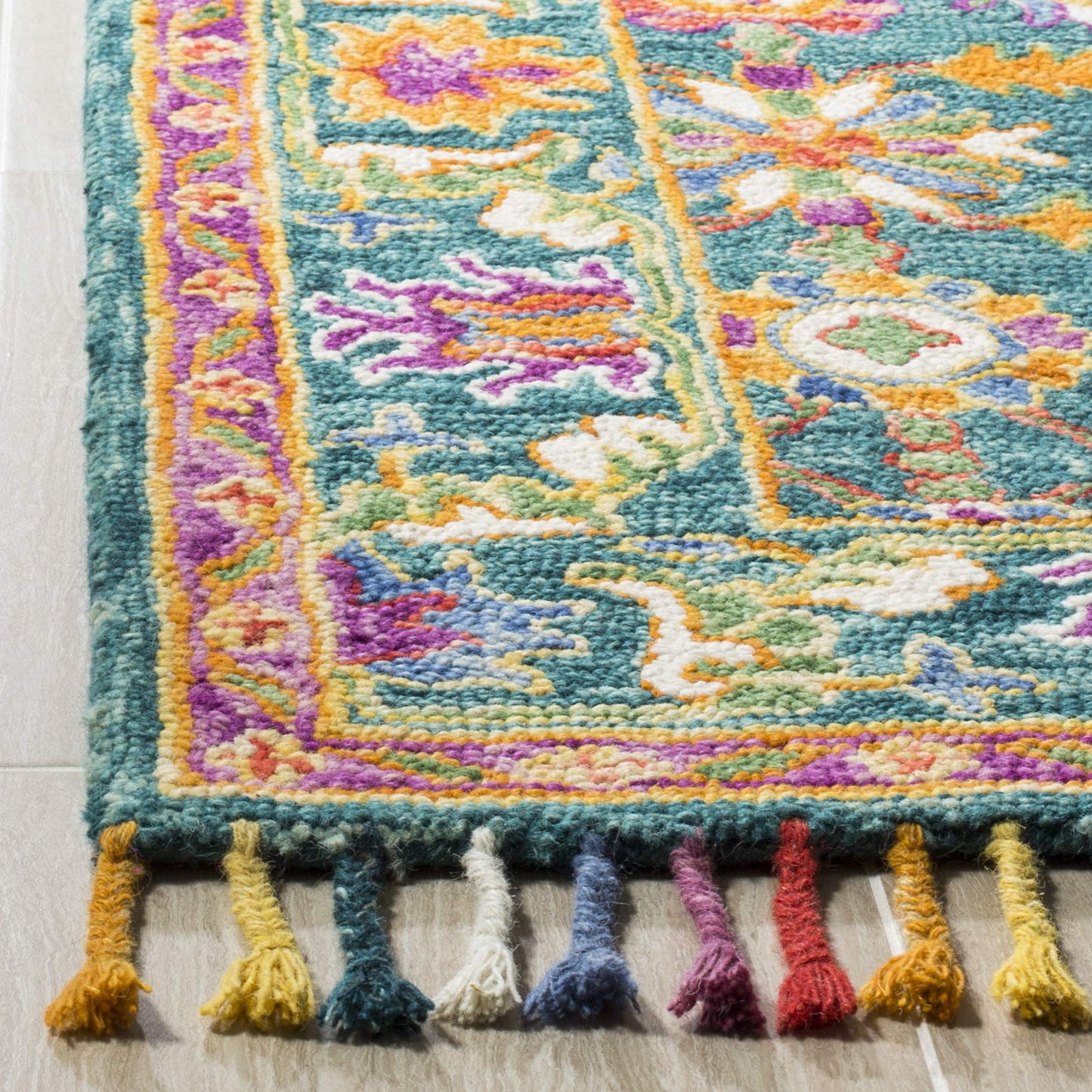 SAFAVIEH Aspen Collection Accent Rug - 2' x 3', Turquoise & Purple, Handmade Boho Braided Tassel Wool, Ideal for High Traffic Areas in Entryway, Living Room, Bedroom (APN113K)