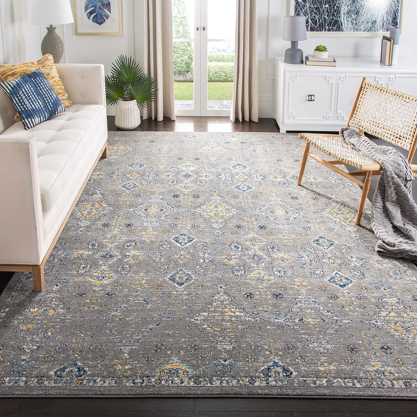 SAFAVIEH Evoke Collection Area Rug - 10' x 14', Dark Grey & Yellow, Boho Oriental Design, Non-Shedding & Easy Care, Ideal for High Traffic Areas in Living Room, Bedroom (EVK224G)